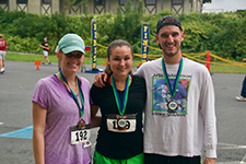 Photo of 3 participants with medals